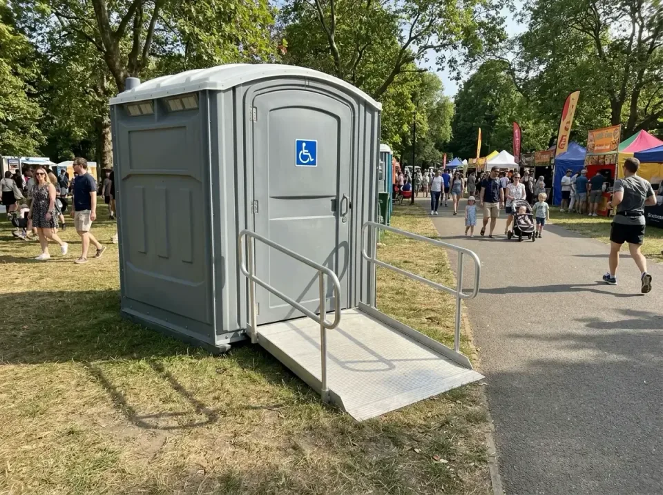 Wheelchair Accessible Porta Potty — Outdoor Event Wheelchair Accessible Porta Potty — Outdoor Event